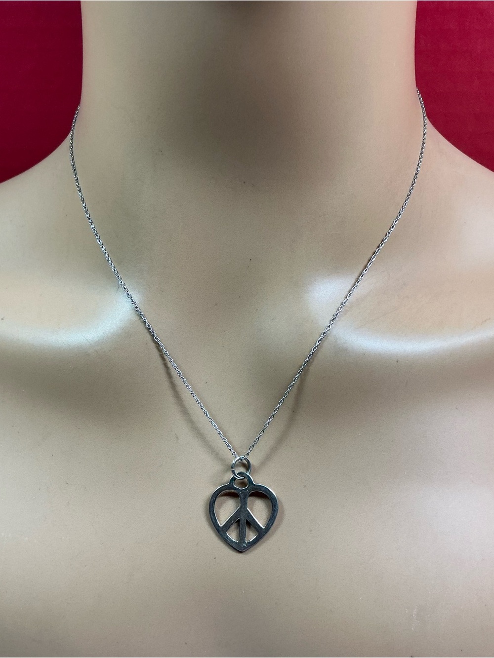 Sterling Silver Chain & Heart Shaped Peace Sign Pendant. 19 inches long